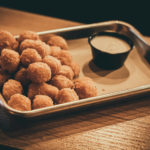 Pepper Jack Bites, Fried Cheese Balls served with mayo at the legendary axe detroit.